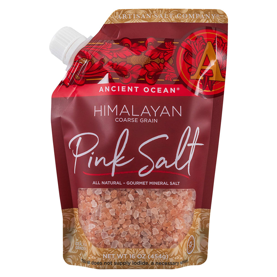 SaltWorks Ancient Ocean pink salt with pour spout for easy seasoning.
