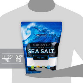 SaltWorks Pure Ocean sea salt fine grain over a pasta dish for flavor.