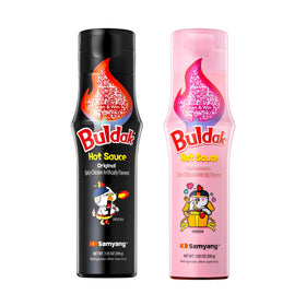 Samyang Buldak Carbonara Sauce bottle close-up with bold spicy aroma.