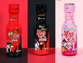 Samyang Carbo Bulldark sauce packaging on display shows a spicy sauce trio.