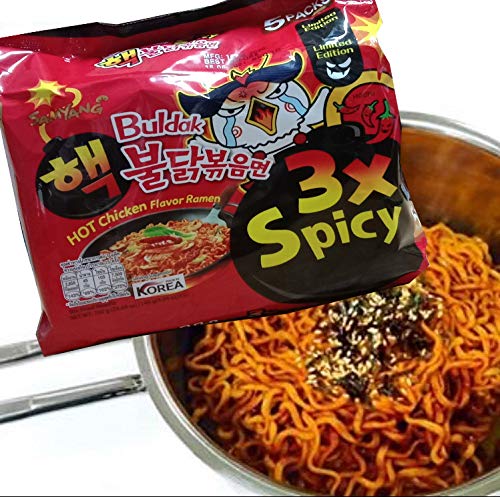 SAMYANG Hot Chicken ramen flakes sesame add aroma and texture.