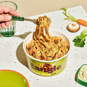Samyang Tangle Bulgogi Alfredo with a spoon for quick, convenient prep.