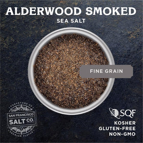 San Francisco Salt Alderwood smoked sea salt pour for controlled, even seasoning.