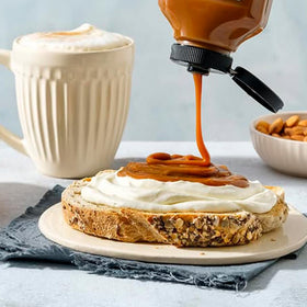 San Ignacio Dulce de Leche on ice cream, silky caramel topping