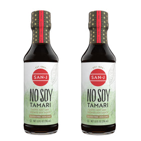 San-J No Soy Tamari bottle pour highlighting rich umami for cooking.