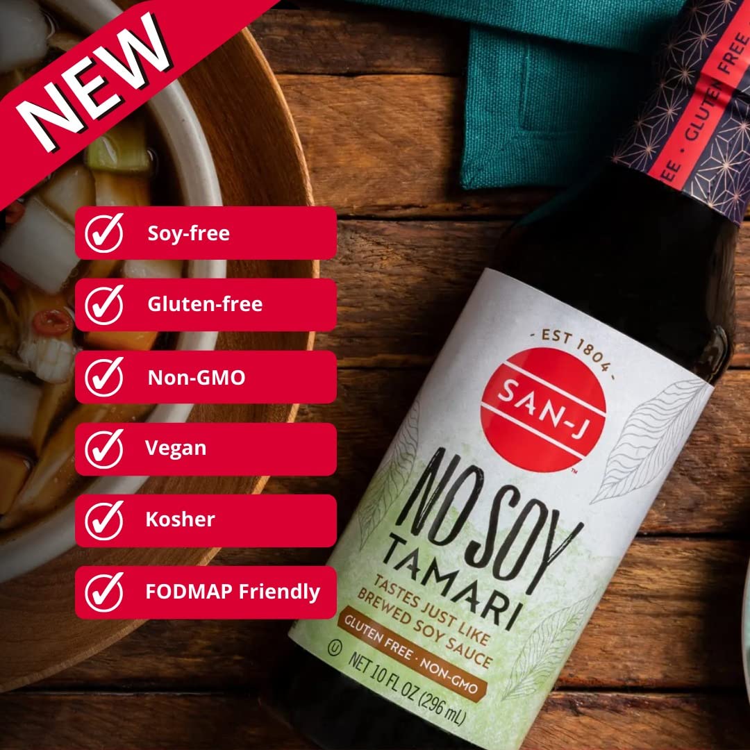 Close-up of San-J No Soy Tamari glass bottle, premium gluten-free flavor.