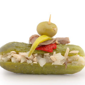 Sanniti anchovy paste detail on olive adds savory depth.