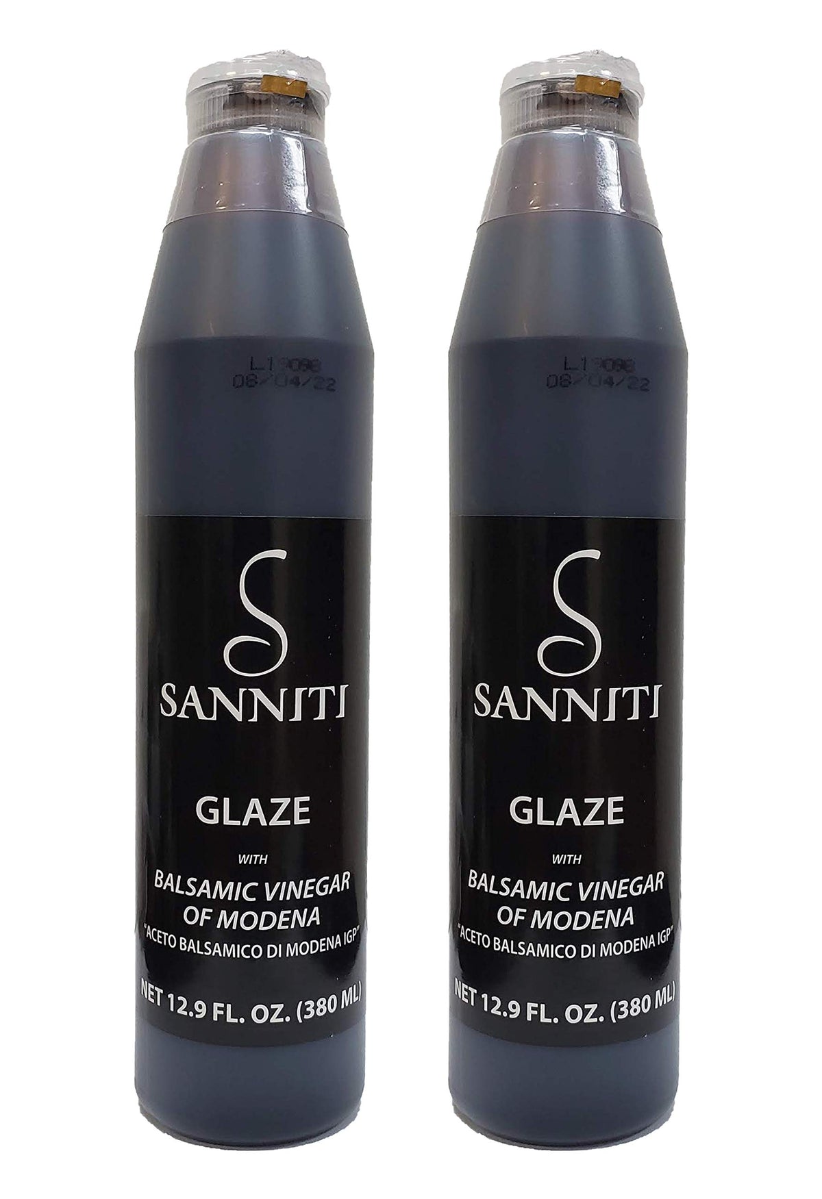 Sanniti balsamic glaze bottle closeup showing deep caramel color for finishing dishes.