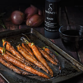 Sanniti balsamic glaze drizzle on salad for a glossy finish.