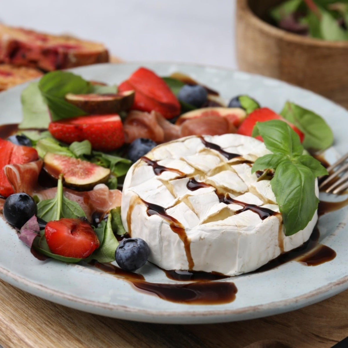 Glass of balsamic with salad versatile finishing touch