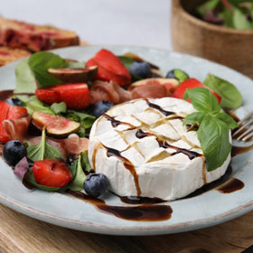 Glass of balsamic with salad versatile finishing touch