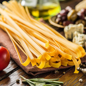 Sanniti bronze-cut pasta close-up with rough texture for sauce grip.