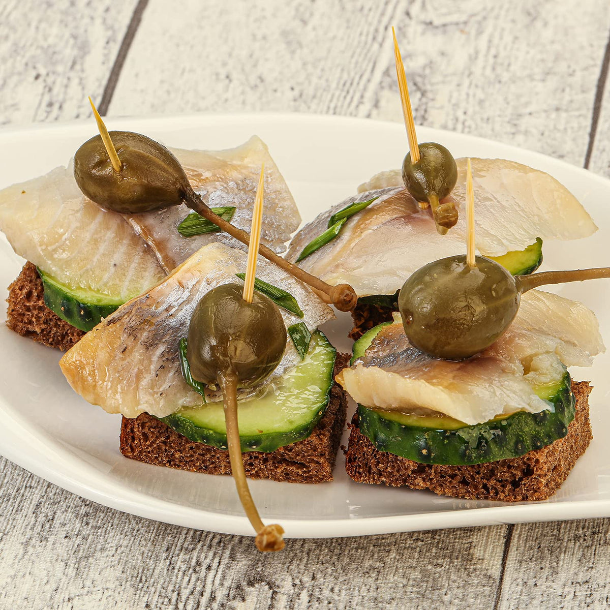 Sanniti caperberries on an entrée plate offer versatile dining options