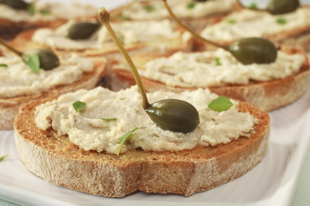 Sanniti caperberries pantry-ready and ready to elevate light meat dishes