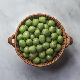 Sanniti Castelvetrano olives offer a mild, buttery bite for snacking.