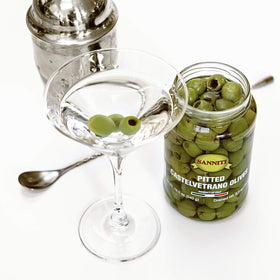 Sanniti olives used as a martini garnish for a subtle briny note