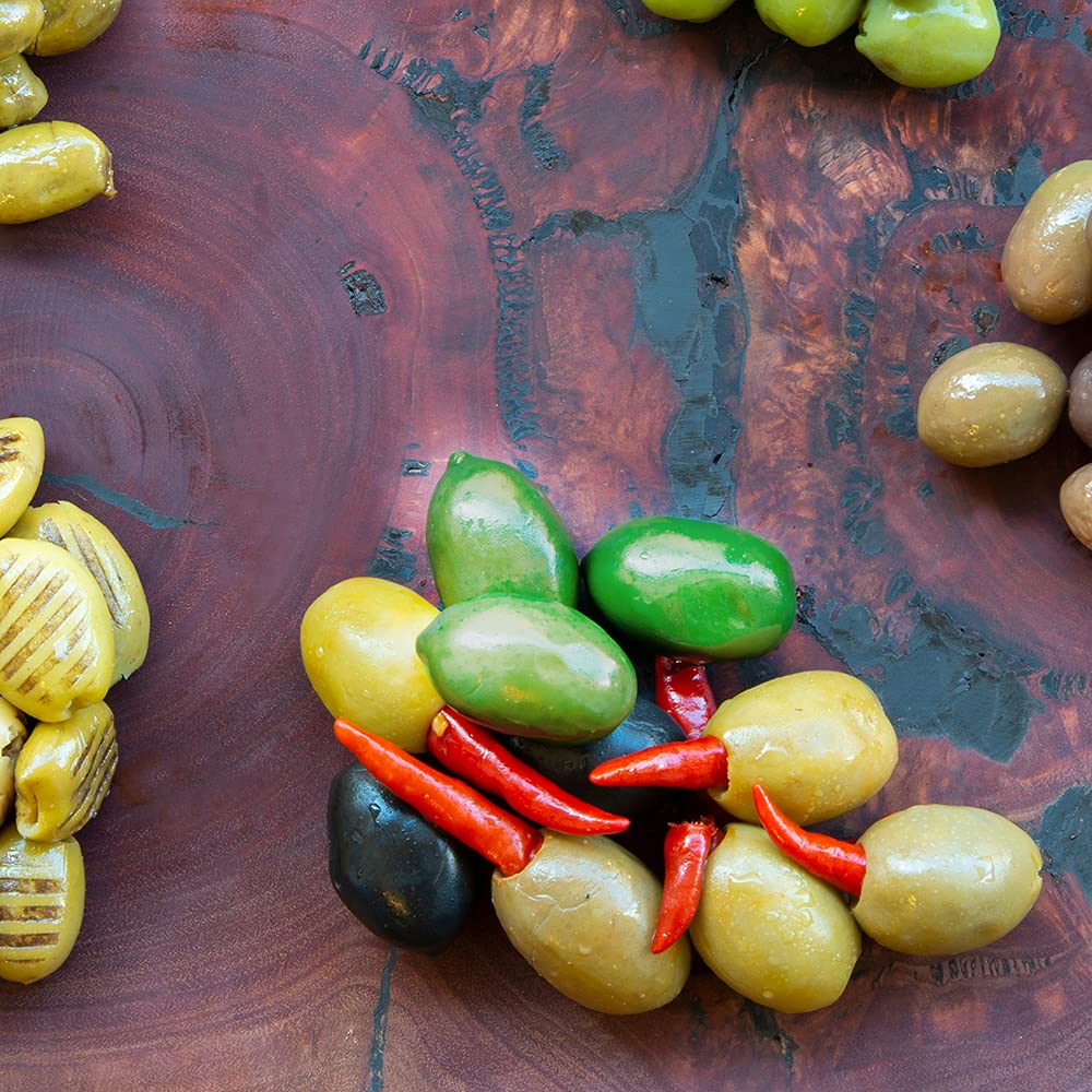 Sanniti Cerignola olives on charcuterie board suggest pairing with cheese and salami.