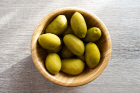 Sanniti olive pasta topping demonstrates versatile use in classic Italian dishes.
