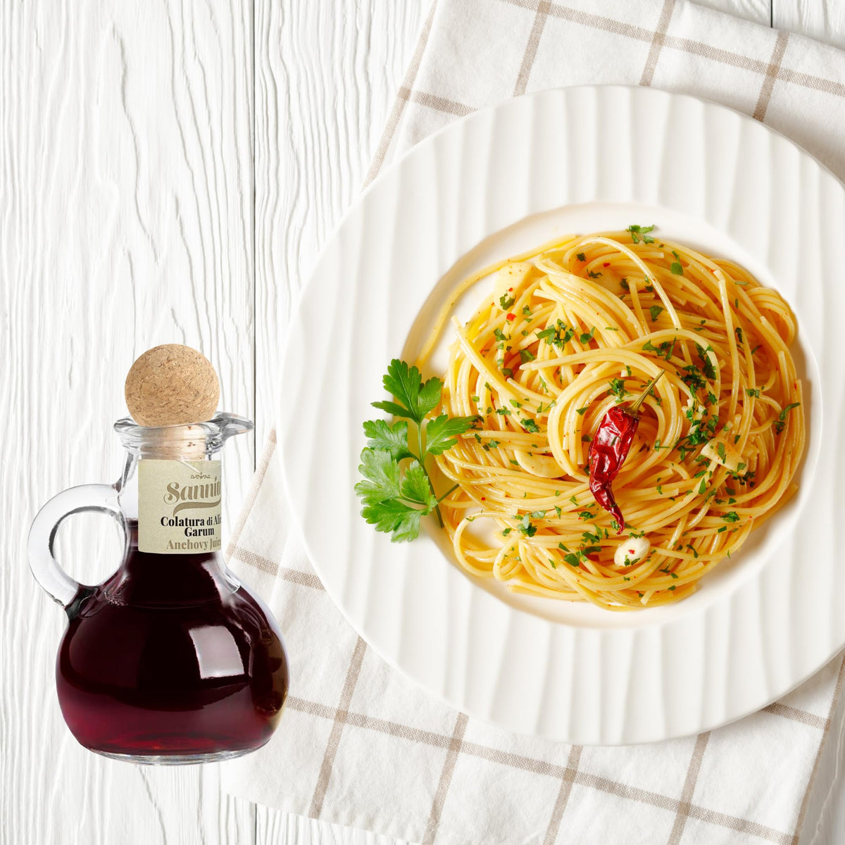 Sanniti Colatura finishing sauce on plate adds depth