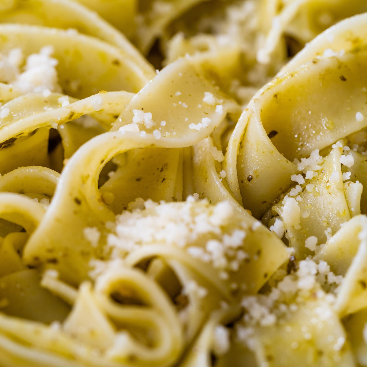 Sanniti gluten-free corn pasta highlighting 100% gluten-free badge.