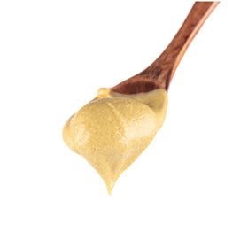 Sanniti Dijon Mustard used in a vinaigrette bowl for salads