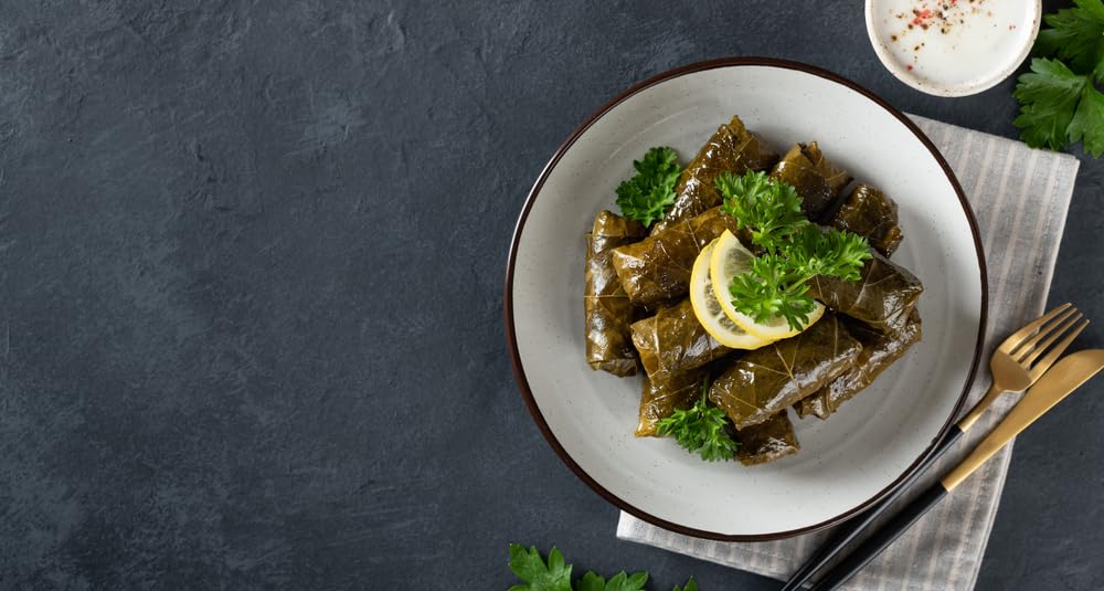Sanniti Dolmas presented with olives and herbs