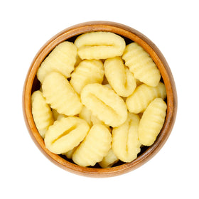 Sanniti family dinner gnocchi serving shows shareable gluten-free comfort.