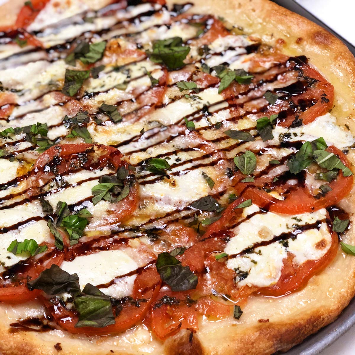 Sanniti Fig Glaze on cheese board elevates savory pairings.