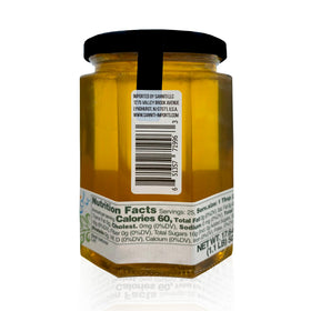 Sanniti Fulmer Acacia honey being poured, delicate floral notes for toast
