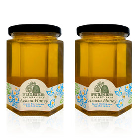 Sanniti Fulmer Hungarian Acacia Honey jar on kitchen shelf, natural sweetness ready to use.