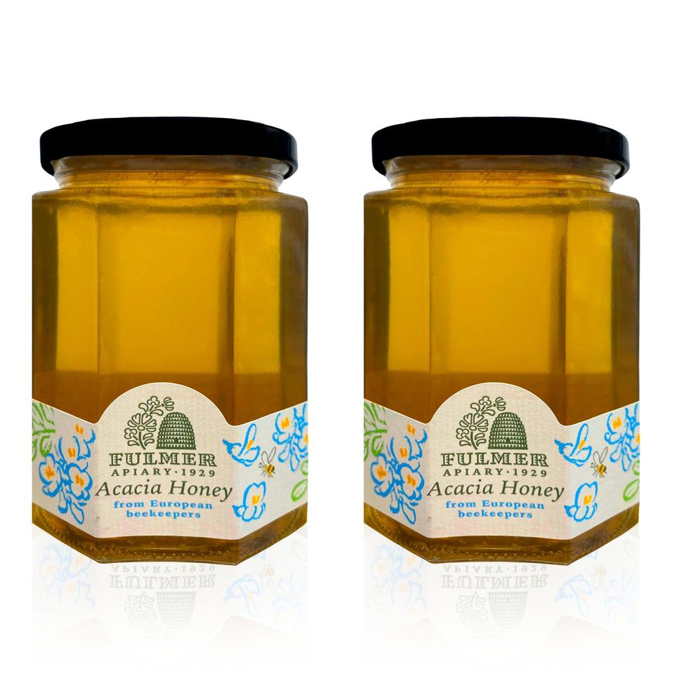 Sanniti Fulmer Hungarian Acacia Honey jar on kitchen shelf, natural sweetness ready to use.