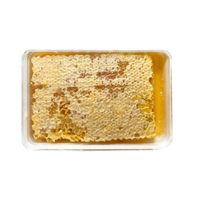 Sanniti Fulmer sun-warmed honeycomb slice highlighting natural color for breakfast.