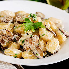Sanniti gluten free dinner ready bowl with sauce.
