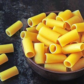 Sanniti rigatoni being cooked in boiling water, ideal for vegan and kosher-friendly recipes.