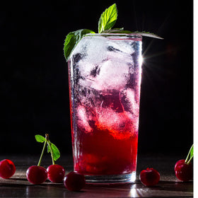 Sanniti Maraschino Cherry Syrup in a cocktail glass boosting flavor