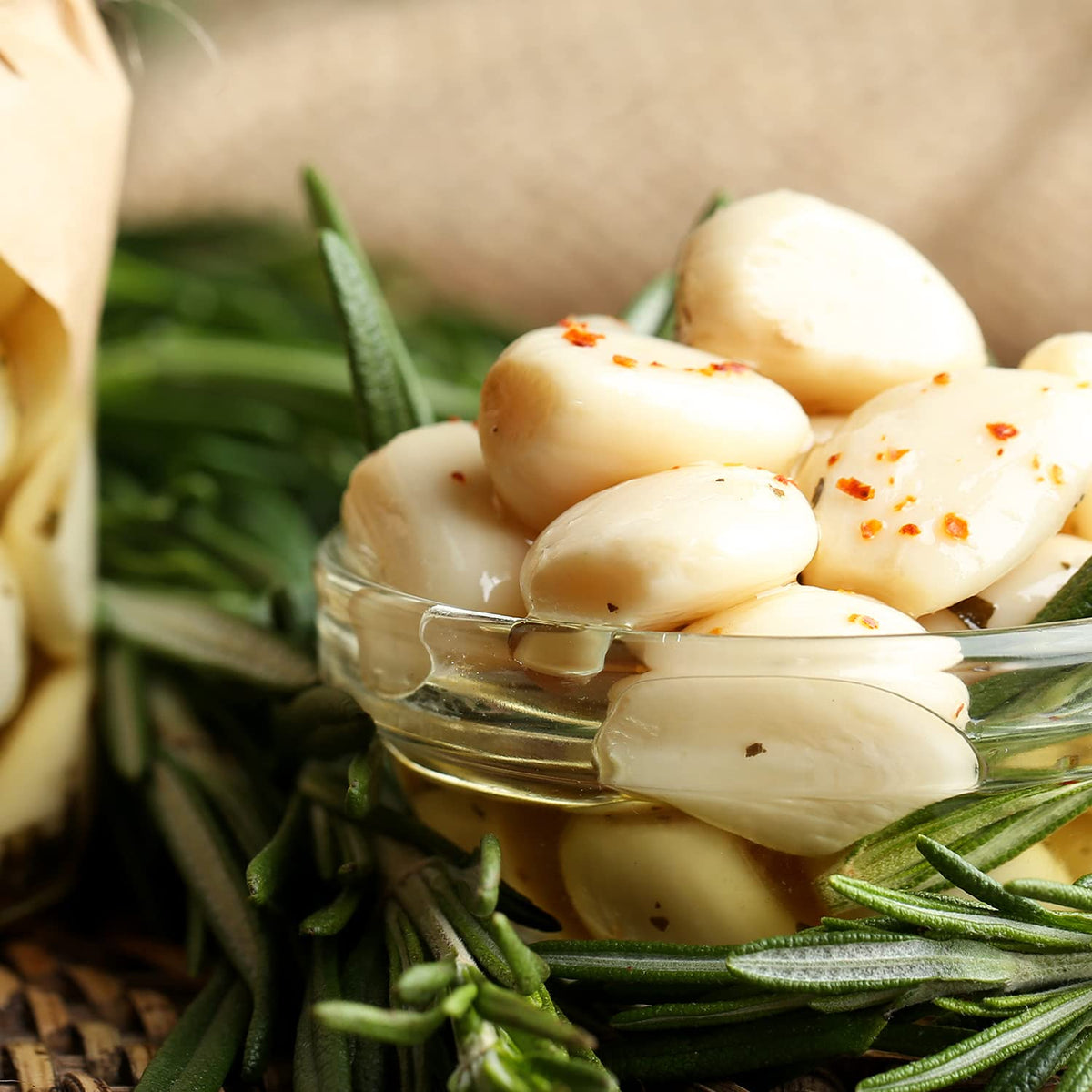 Sanniti pickled garlic jar closeup, showing mild flavor perfect for tapas