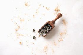 Sanniti kitchen scene featuring capers nonpareille and fresh ingredients.