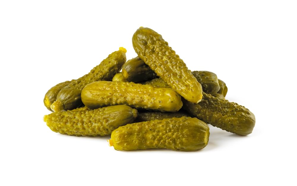 Sanniti cornichons at a deli counter ready for purchase.