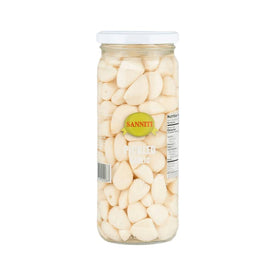 Sanniti Spanish Pickled Garlic in a glass jar enhances sauces