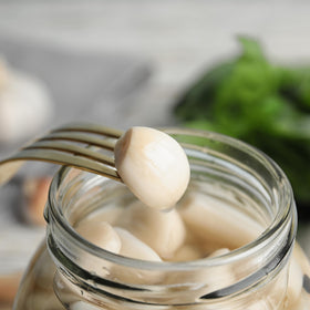 Sanniti Spanish Pickled Garlic on pasta adds savory brightness