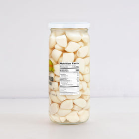 Sanniti Spanish Pickled Garlic slices arranged for tapas-style serving