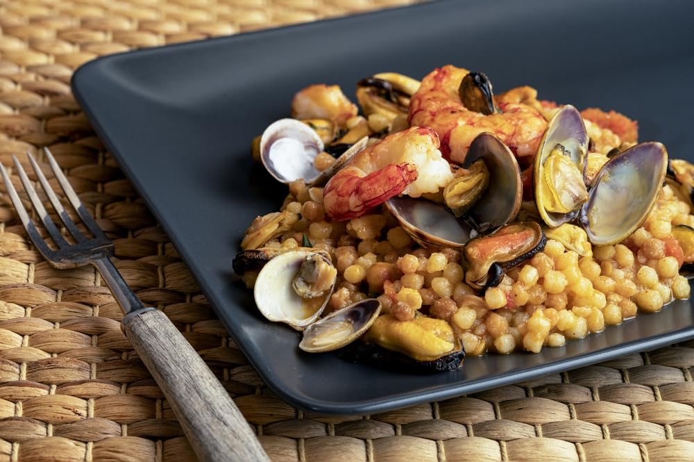 Sanniti fregola plated dish shows versatile serving ideas