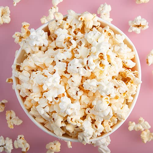 Sanniti Vinegar Powder sprinkled on popcorn for tangy snacking.
