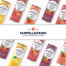 Sanpellegrino Zero Added Sugar Pomegranate Orange cans on a kitchen counter during a family gathering