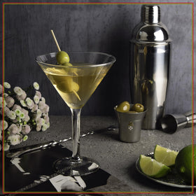 Finished dirty martini served with Santa Barbara Olive Co mix and stuffed olives