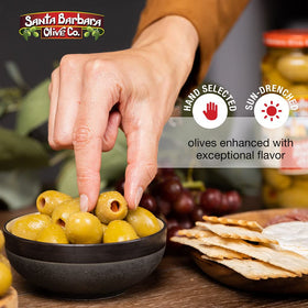 Santa Barbara Olive Co hand stuffed olive closeup showing creamy blue cheese center