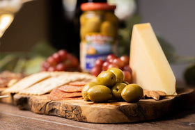 Jalapeño stuffed olives with bread and crackers pairing from Santa Barbara Olive Co