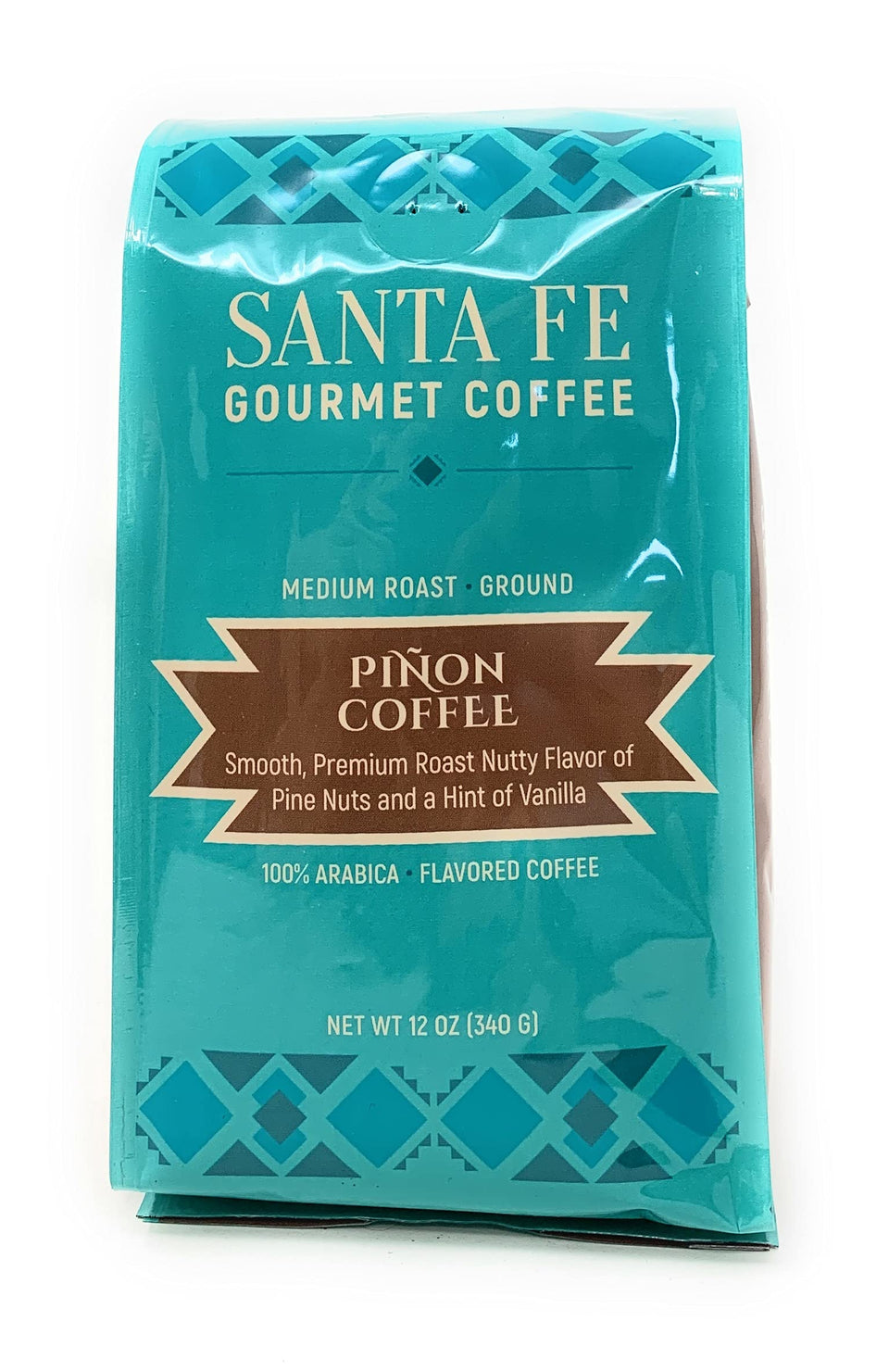 Santa Fe Seasons Pinon Ground coffee bag highlighting pine nut notes and vanilla aroma.