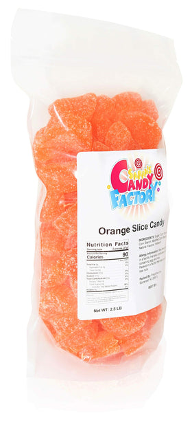 Sarah's Candy Factory orange slice candy close-up highlights chewy texture and bright citrus color.