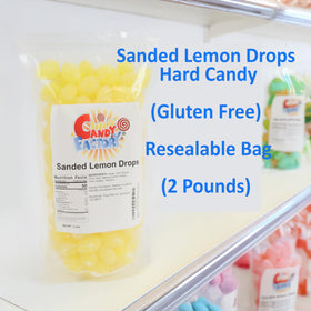 Sarah's Candy Factory lemon drops in a bag open for easy access and sharing.